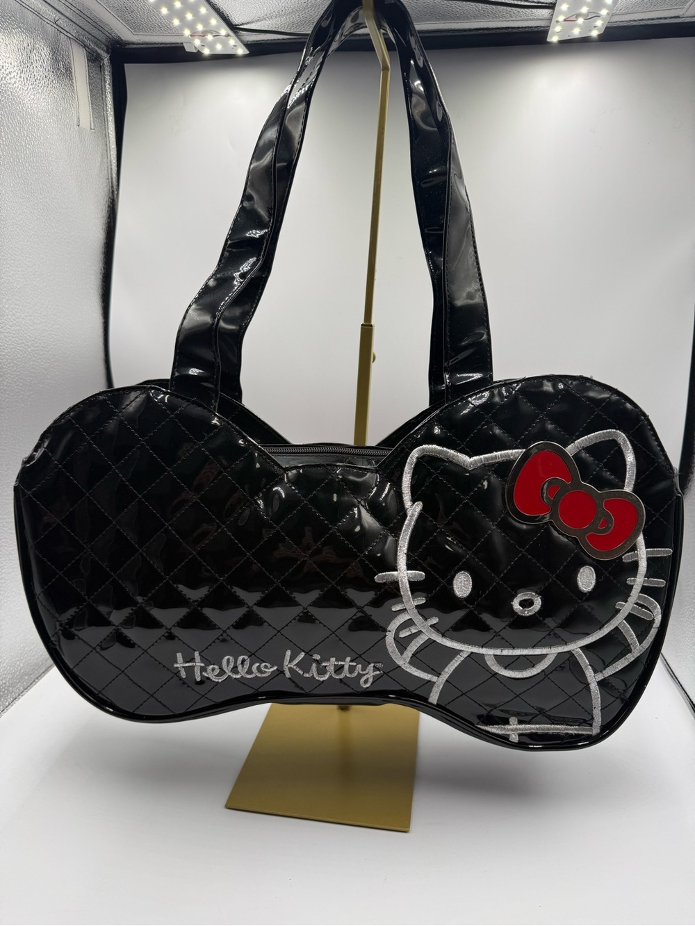 Loungefly Hello Kitty  Bow Shaped Quilted Patent Leather Handbag Black & Red